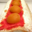 Roll with cream and Apricot in syrup