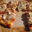 Pizza with cheese, William pears in syrup and Acacia Blossom honey